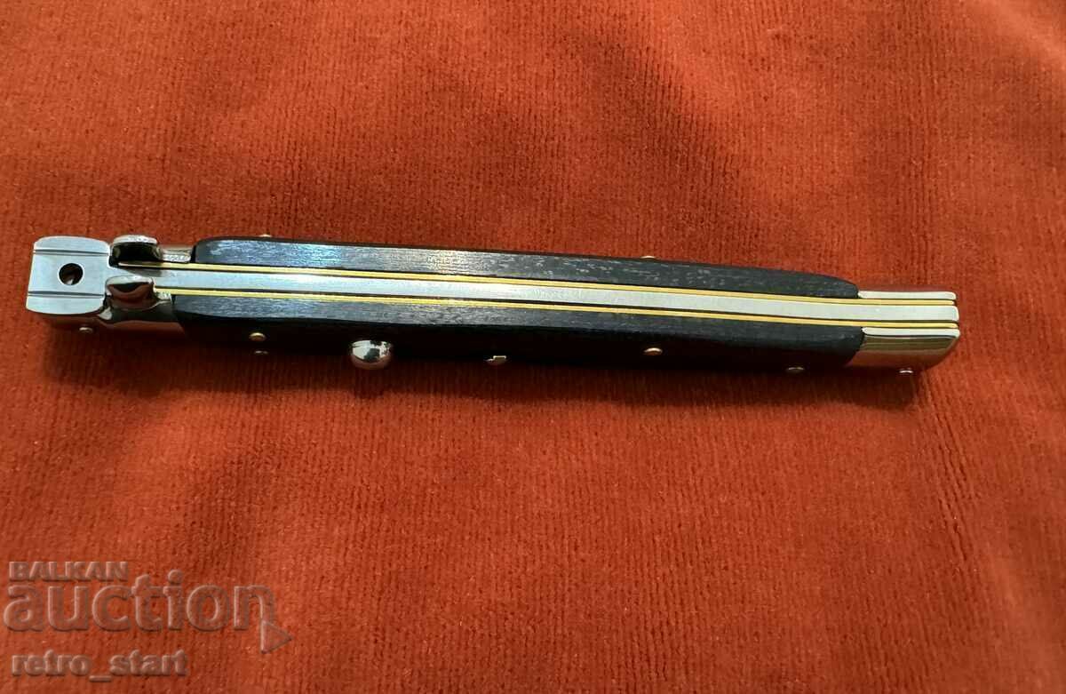 Auction Large automatic knife Auction Large automatic knife