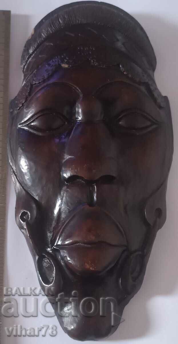 Old wooden wall mask