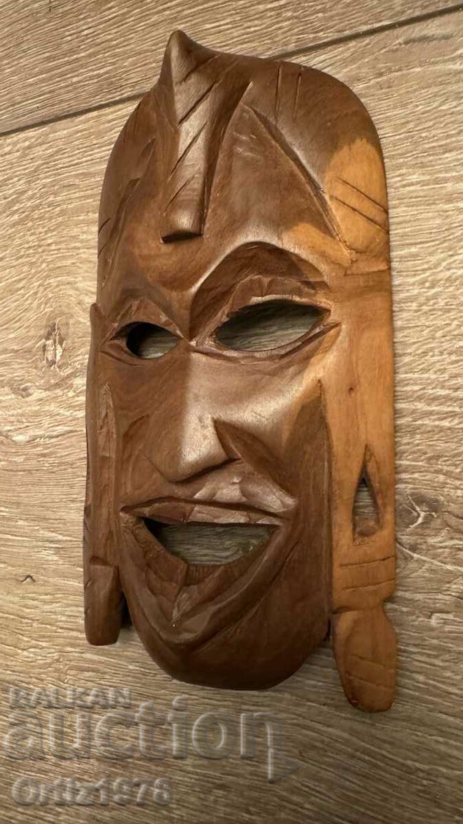 Auction African small wooden mask, handmade. Auction African small wooden mask, handmade.