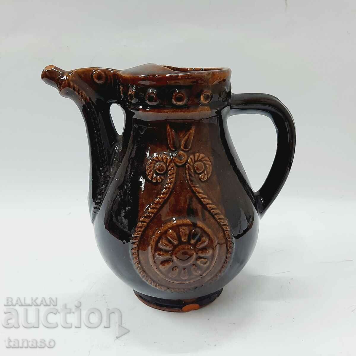Old ceramic jug, decorated (13.5)