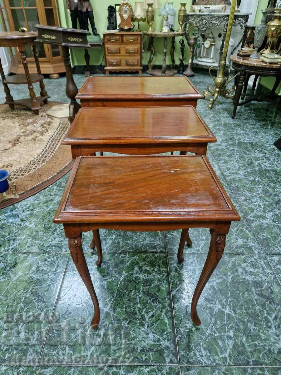 A lovely antique set of coffee tables