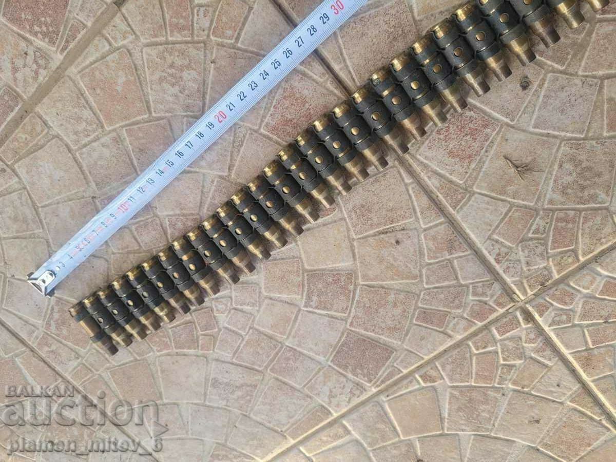 Delivery of machine gun belt, cartridges, casings Delivery of machine gun belt, cartridges, casings