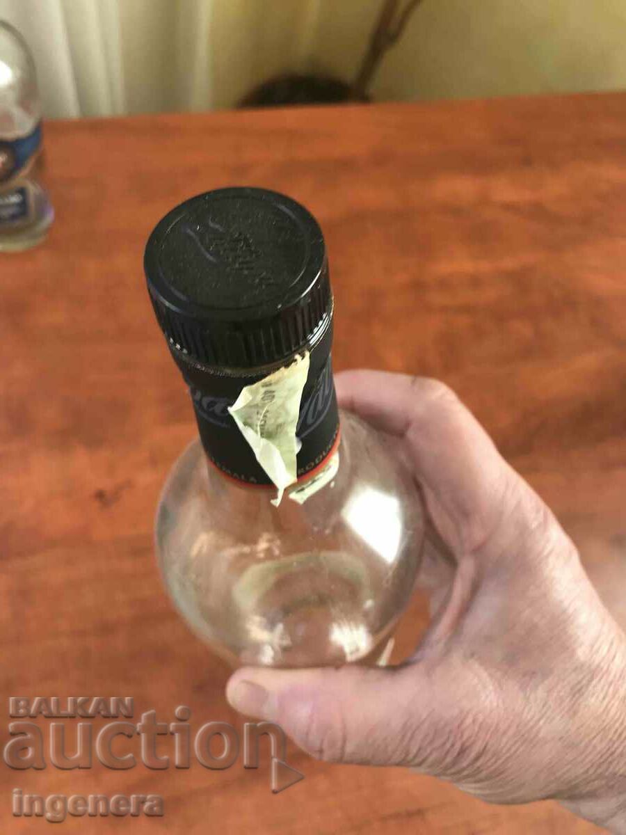 Auction  RUM GLASS BOTTLE BOTTLE