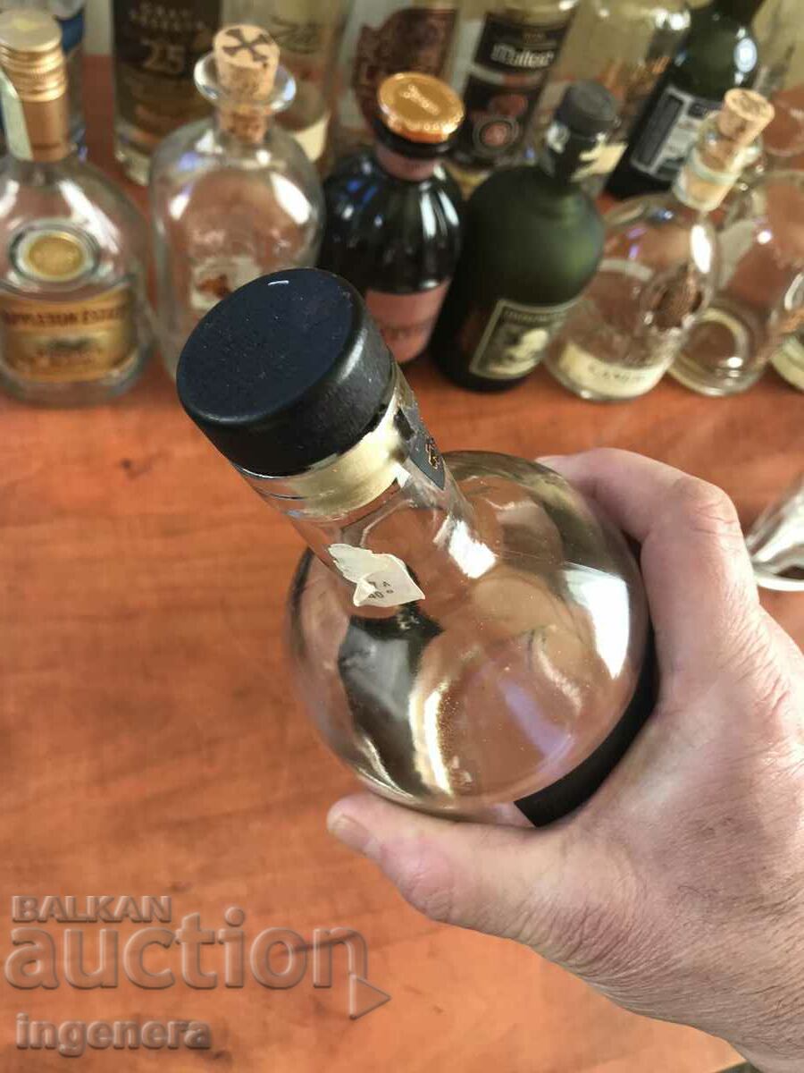 Auction  RUM GLASS BOTTLE BOTTLE