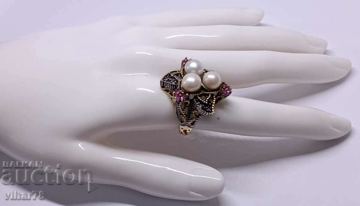 Auction  Ring with pearls, rubies, diamonds - made of 9 carat gold and