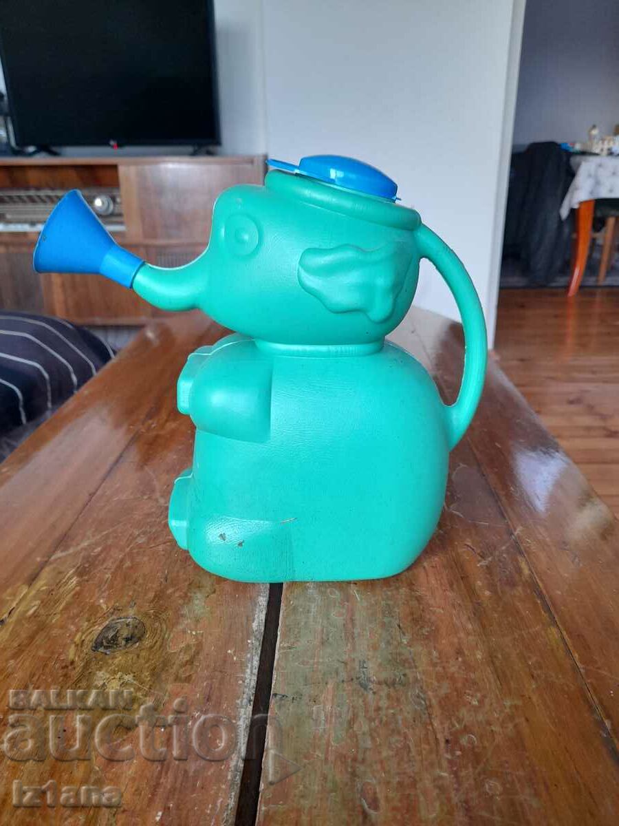 Old children's watering can