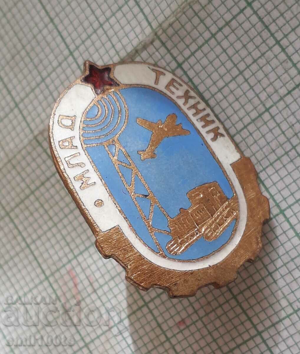 Delivery of Badge - Young technician - on screw