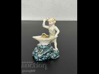 Old porcelain figurine. #5007
