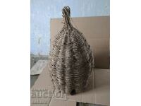 Old wicker basket, beehive for catching bees