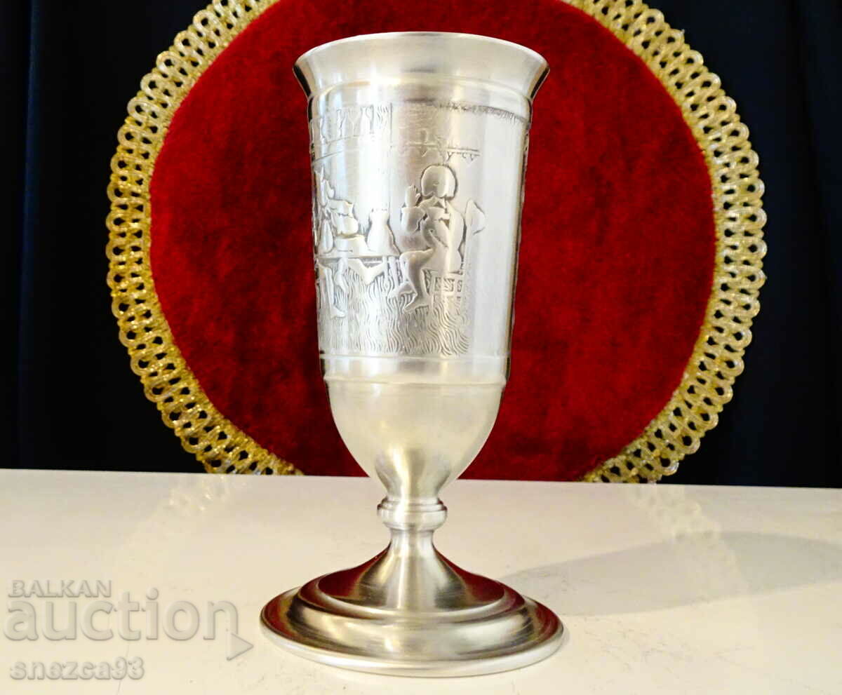 Pewter wine goblet with embossed pub picture.