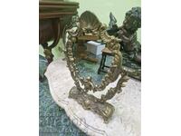 A wonderful antique bronze French mirror