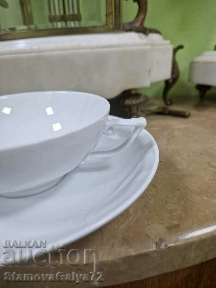 Livrarea Un minunat set dublu din porțelan de designer antic