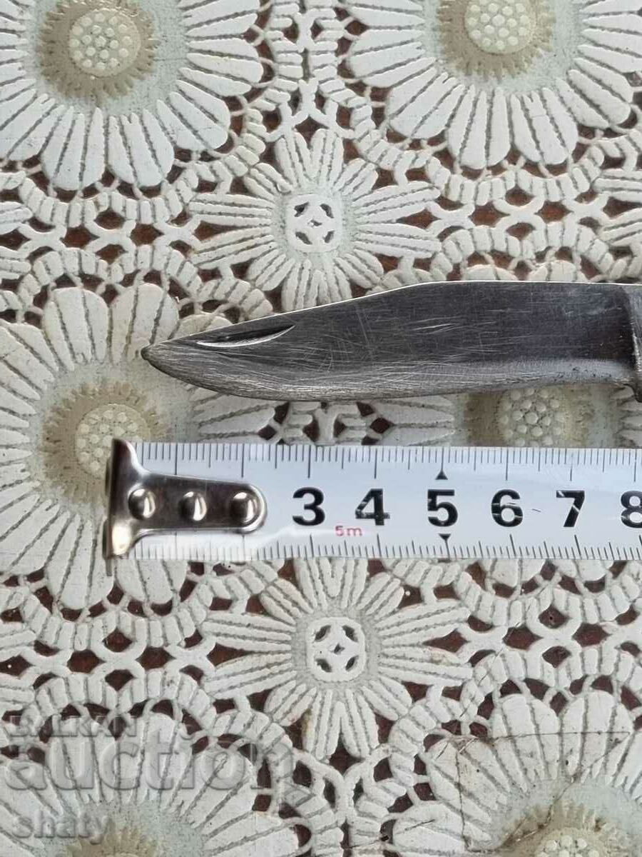 Auction An old knife. BG Knife. A lady's leg. Auction An old knife. BG Knife. A lady's leg.