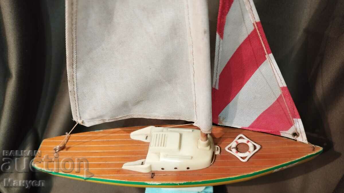 Auction Old model of a yacht, a sailboat. Auction Old model of a yacht, a sailboat.