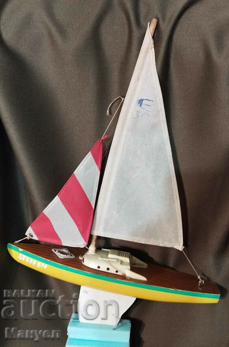 Delivery of Old model of a yacht, a sailboat. Delivery of Old model of a yacht, a sailboat.