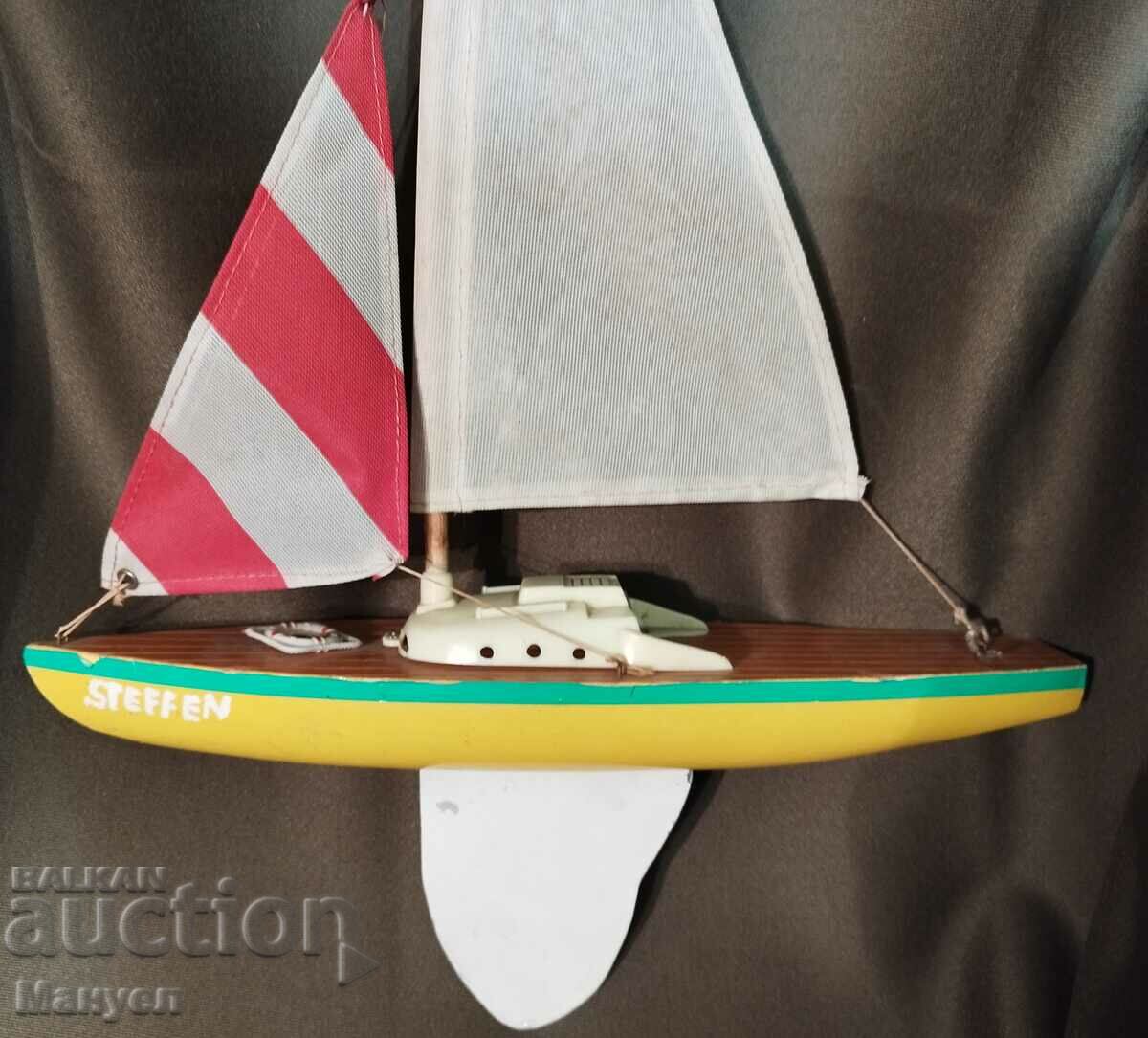 Old model of a yacht, a sailboat. - 5 Old model of a yacht, a sailboat. - 5