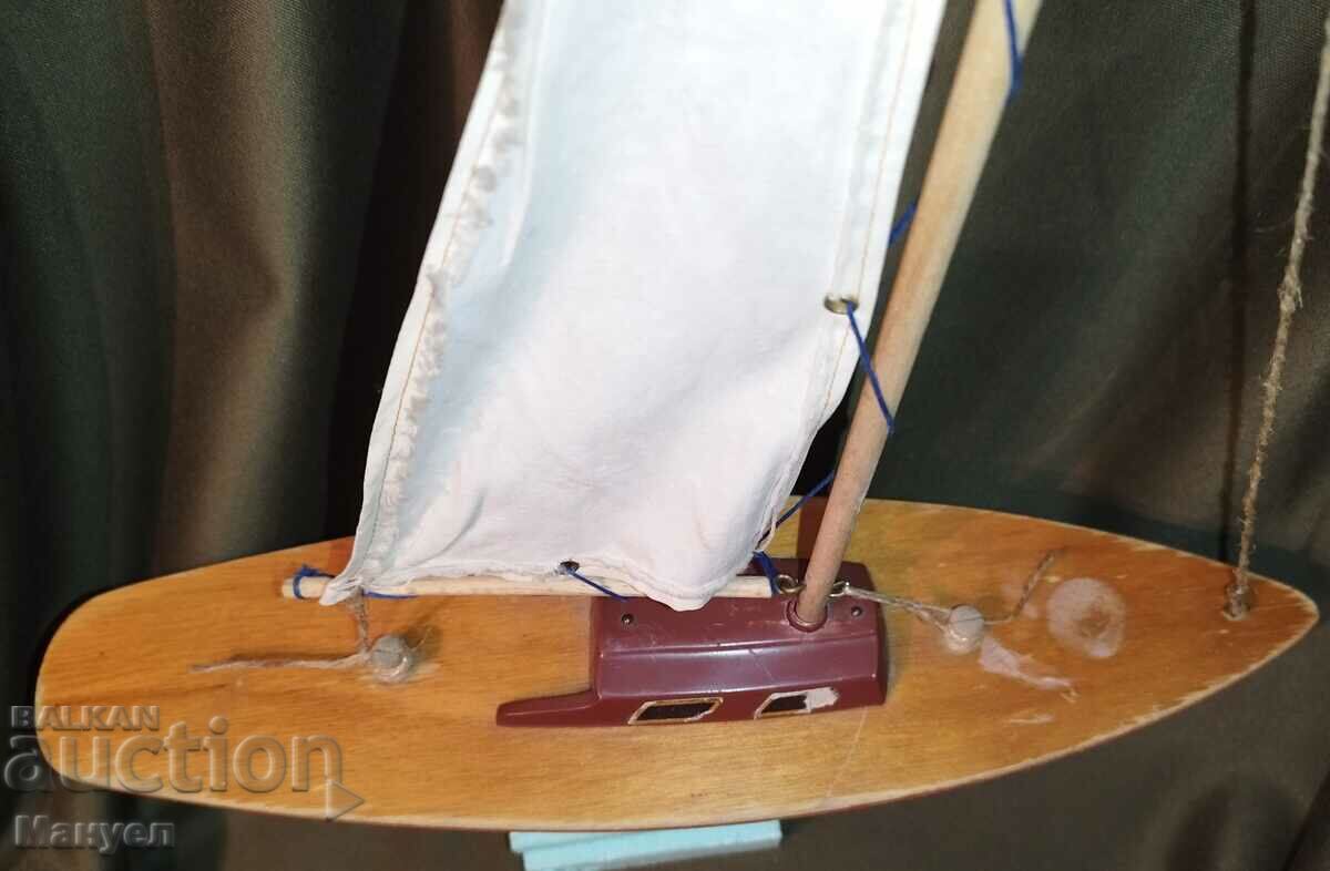 Auction Old model of a yacht, a sailboat. Auction Old model of a yacht, a sailboat.