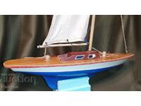 Old model of a yacht, a sailboat.