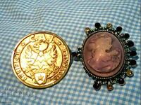 a cameo brooch and an Italian brooch for a tourist
