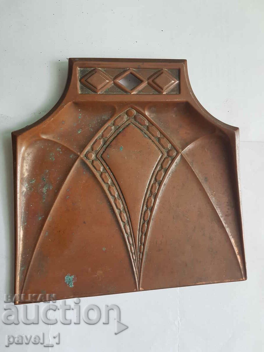 Old copper spatula with ornaments