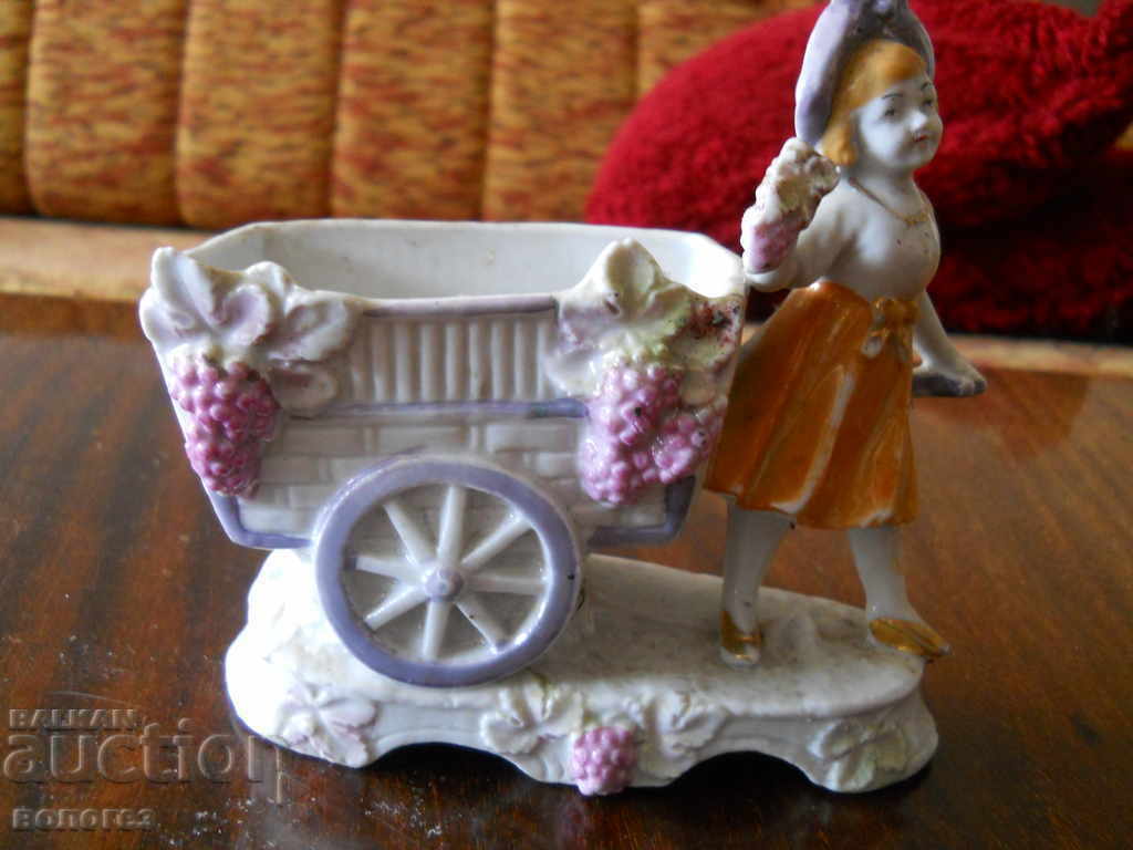 antique porcelain statuette - grape picker
