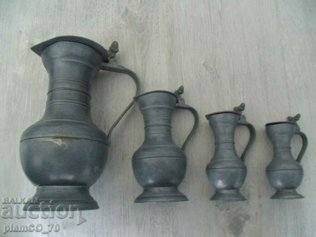 No.*7403 four old metal jugs - with metal lids with price 60.00 BGN | € 30.68 No.*7403 four old metal jugs - with metal lids with price 60.00 BGN | € 30.68