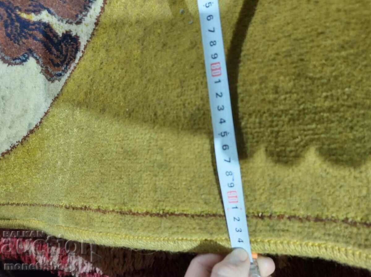 Παράδοση Μια τεράστια υφαντή ταπετσαρία με μια εικόνα του Ιησού Χριστού