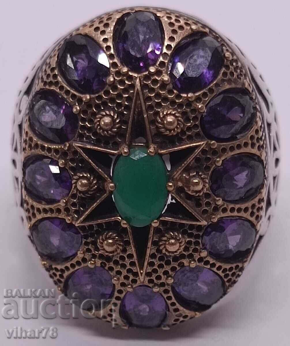 Old silver ring with amethyst and synthetic emerald