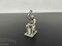 Miniature lead figure of a blacksmith - De Munter. #5064