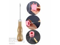 Candle making awl threading wick for mold