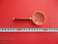 A great gold-plated magnifying glass