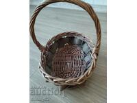A small woven wooden basket