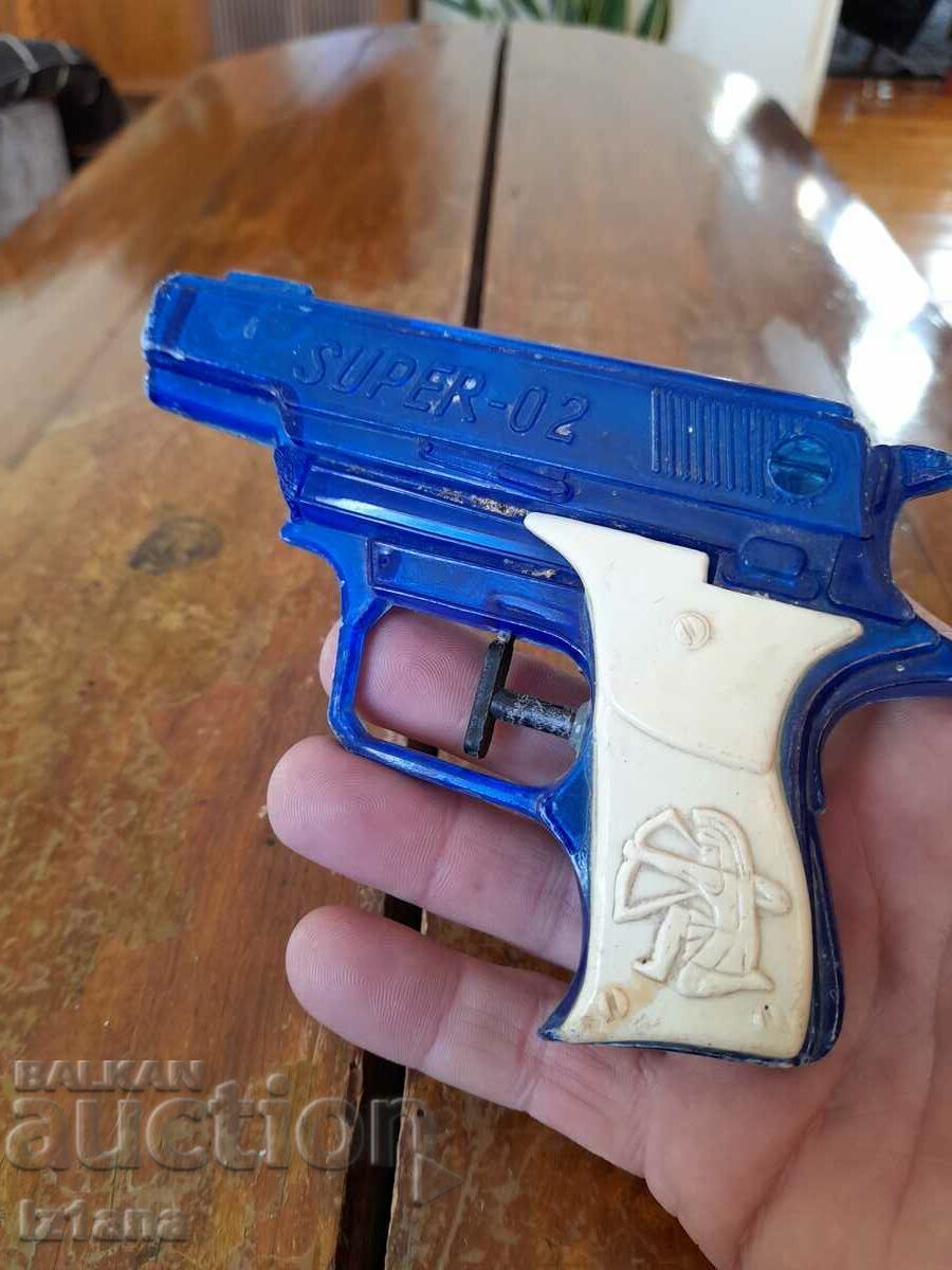 Old water gun, toy with price 6.00 BGN | € 3.07 Old water gun, toy with price 6.00 BGN | € 3.07