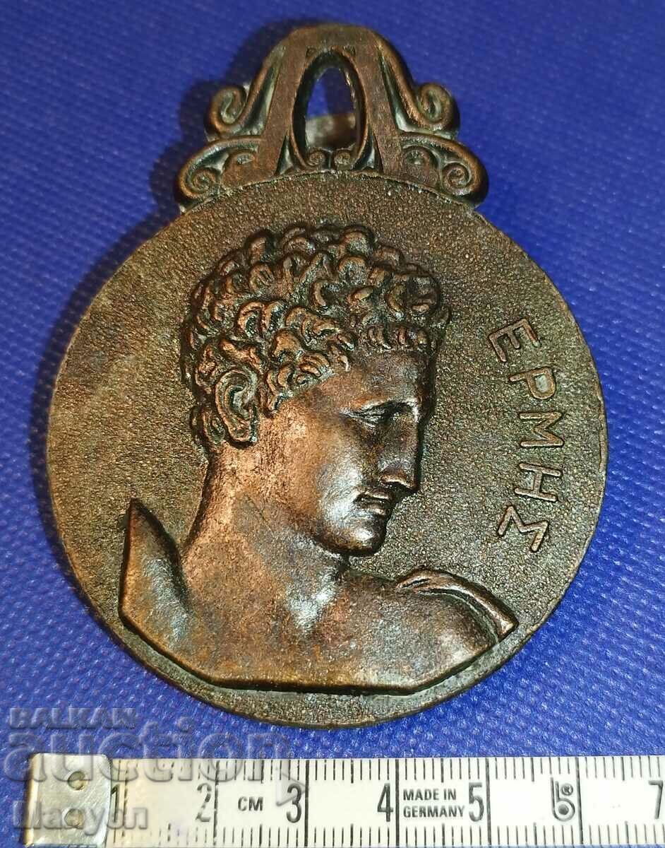 Auction  An old paper clip.