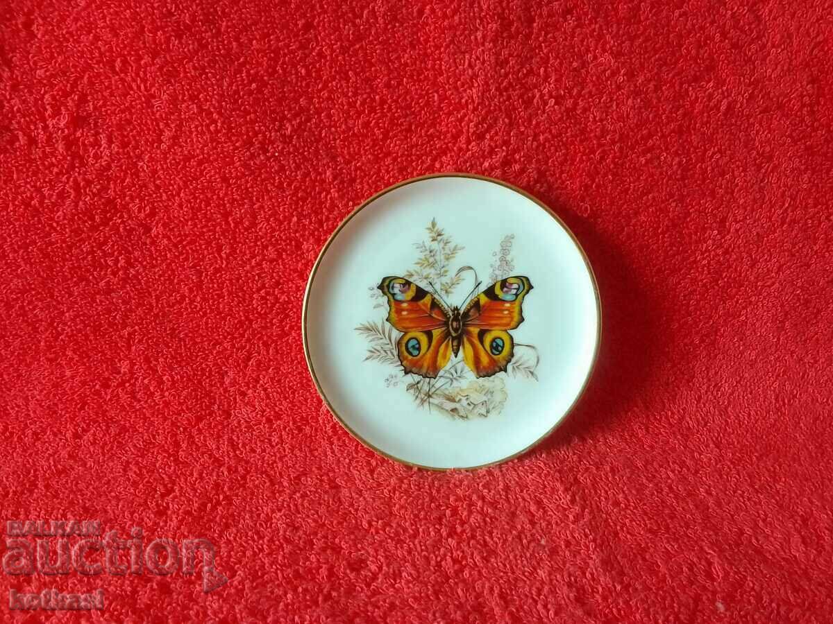 Old small porcelain plate Peacock butterfly marked