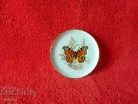 Old small porcelain plate Peacock butterfly marked