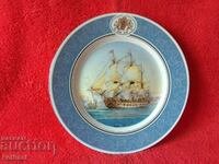 Old porcelain plate signed Ship Galleon Sea