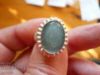 silver ring with natural emerald