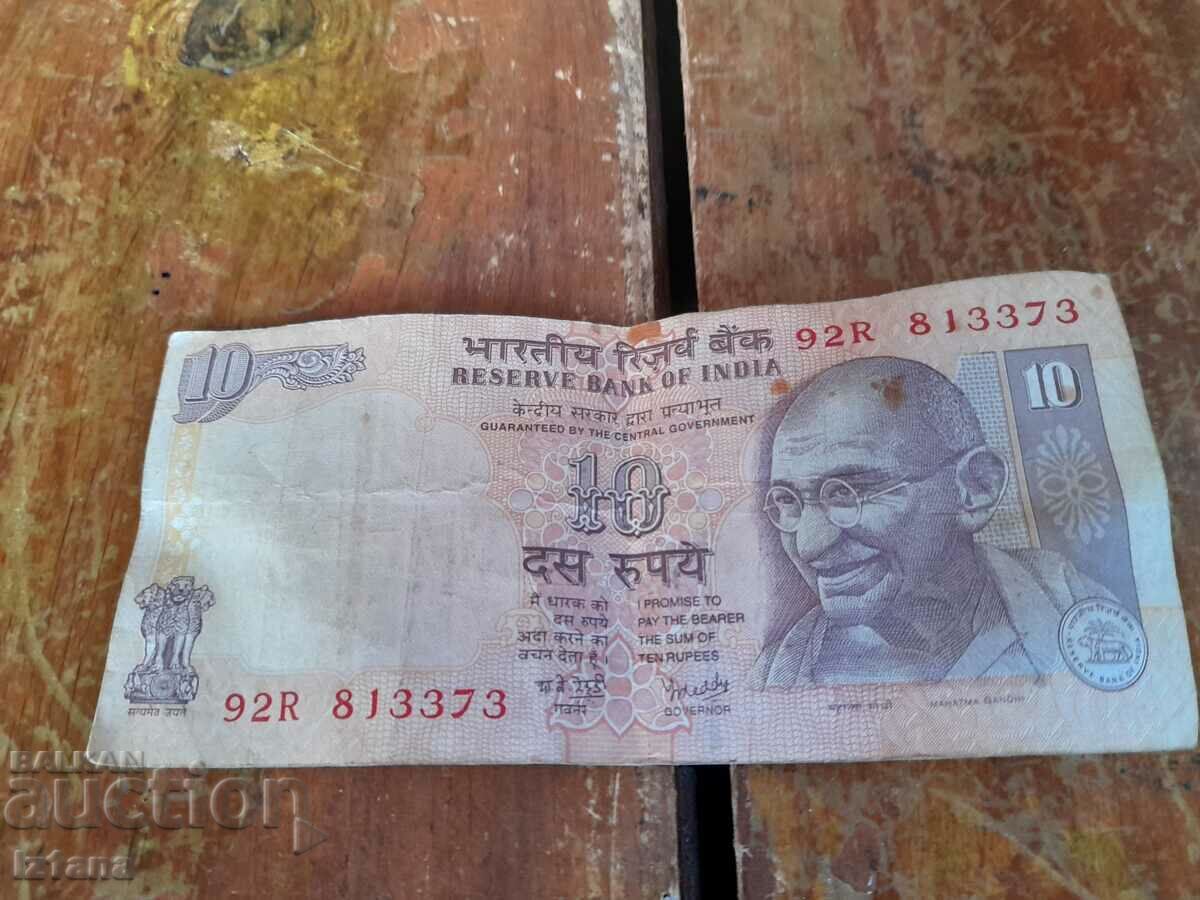 Delivery of Banknote 10 Rupees India Delivery of Banknote 10 Rupees India