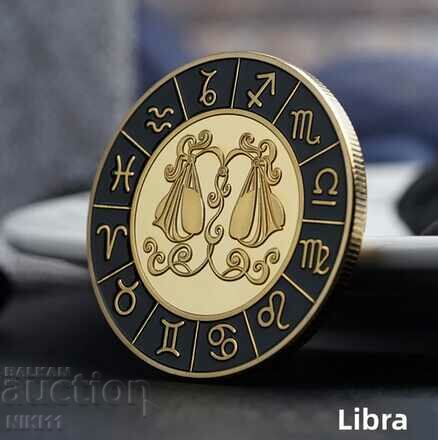 Libra zodiac coin in a protective capsule, zodiac signs, zodiac