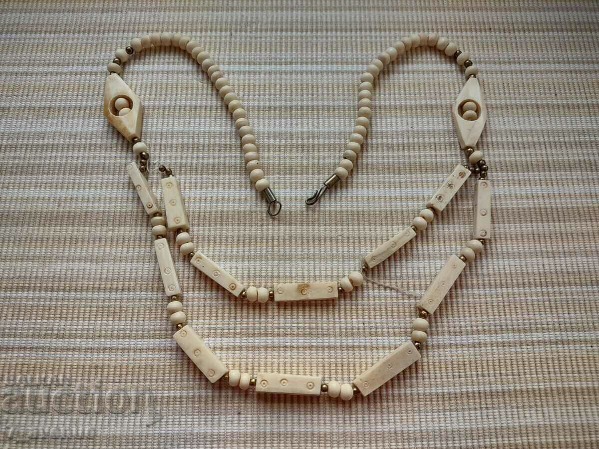 Delivery of NECKLACE bone necklace, very stylish