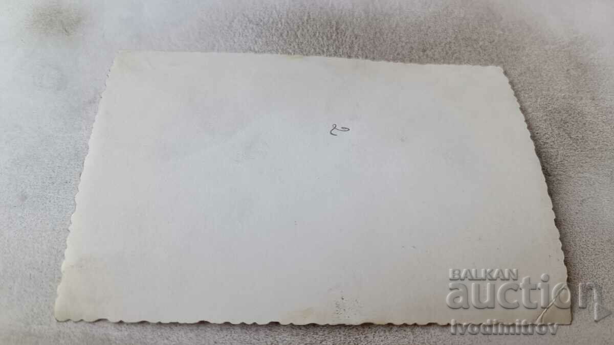 Photo Sofia Man, woman and boy in front of the church of St. Sofia with price 1.65 BGN | € 0.84