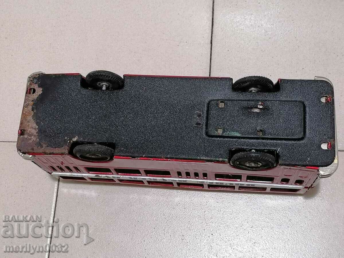 Auction Children's tin toy bus, car, stroller Auction Children's tin toy bus, car, stroller