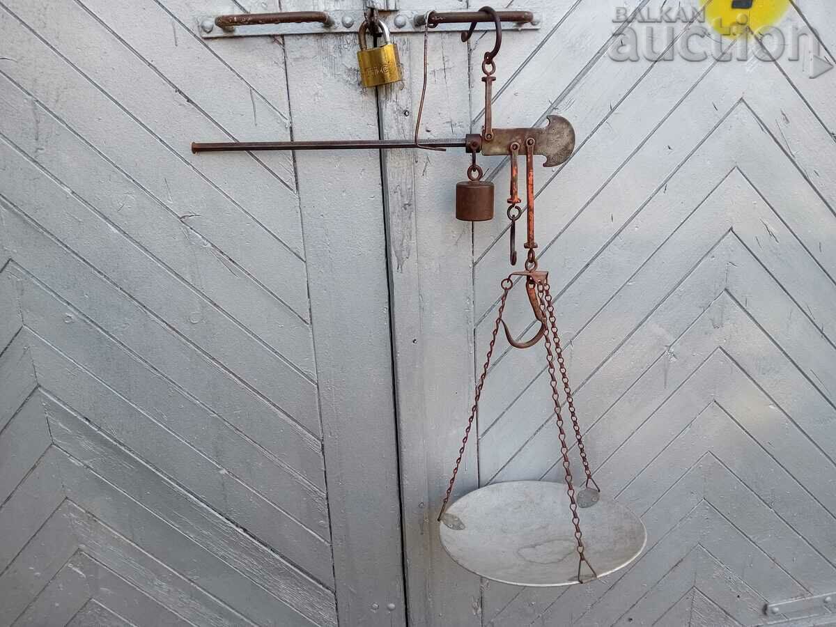 old scales with a pavanza and a hook weighing 30 kg