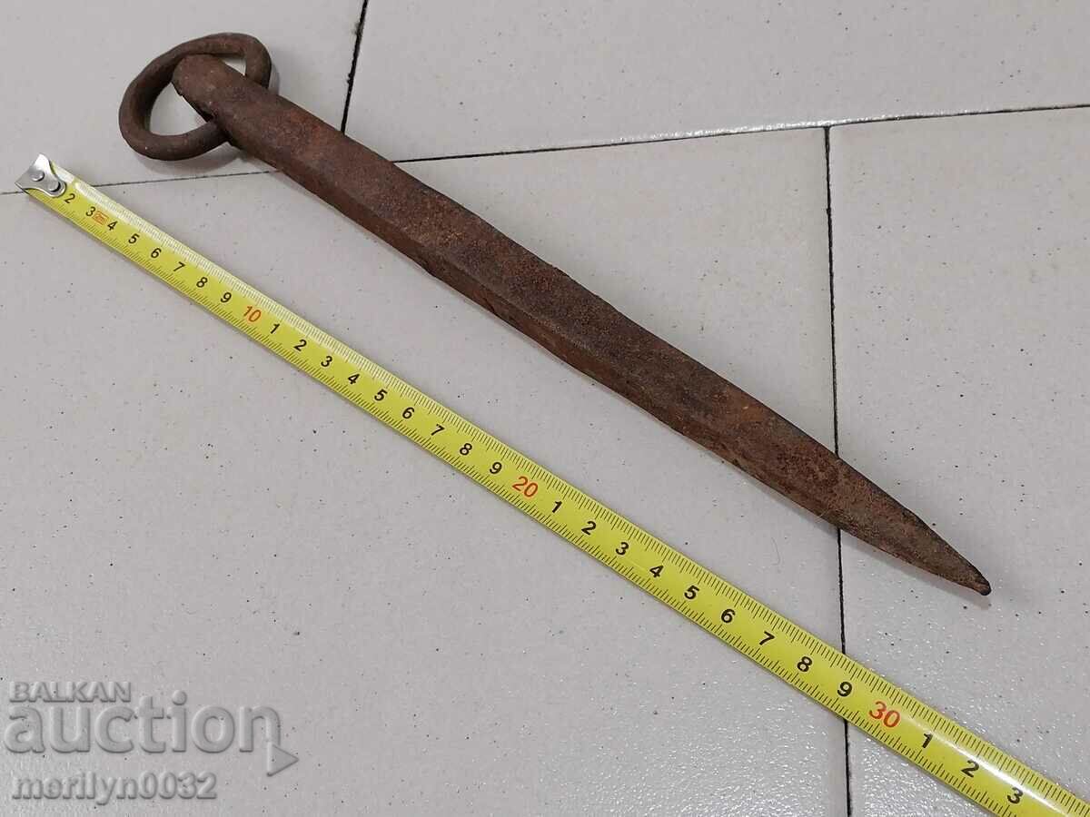 Auction An old donkey's tack, a huge nail, wrought iron Auction An old donkey's tack, a huge nail, wrought iron