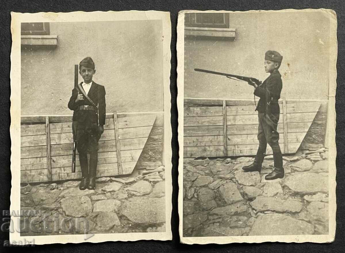 Boy with rifle and Brannik belt knife