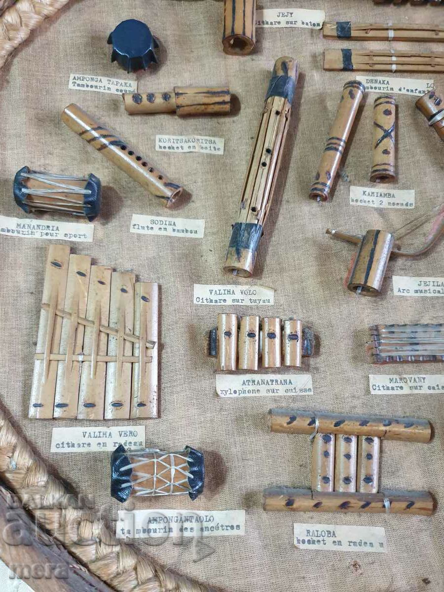 Auction  Vintage board of traditional Madagascar instruments