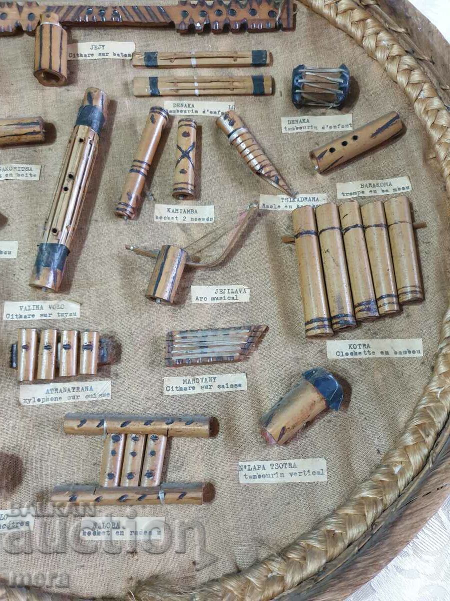 Delivery of Vintage board of traditional Madagascar instruments