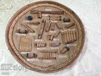 Vintage board of traditional Madagascar instruments
