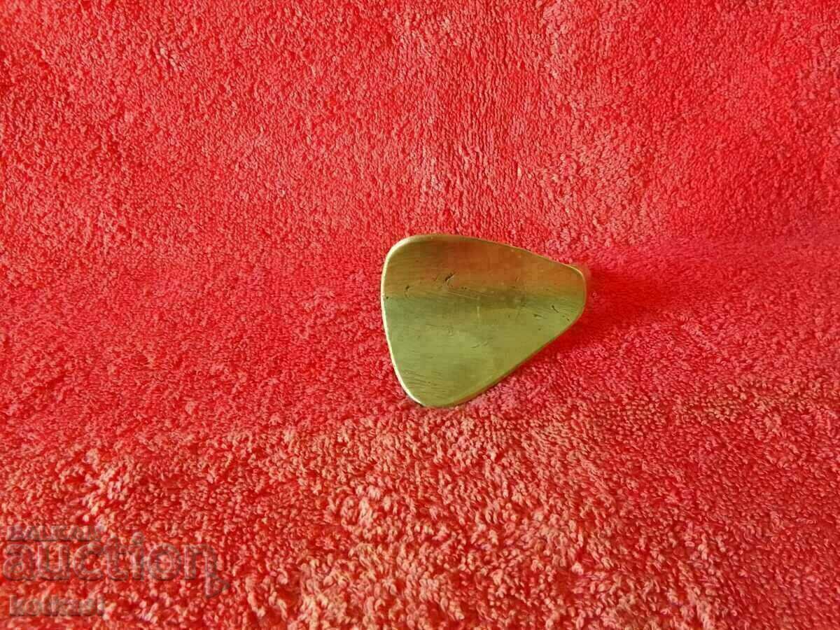 Old metal bronze shoemaker